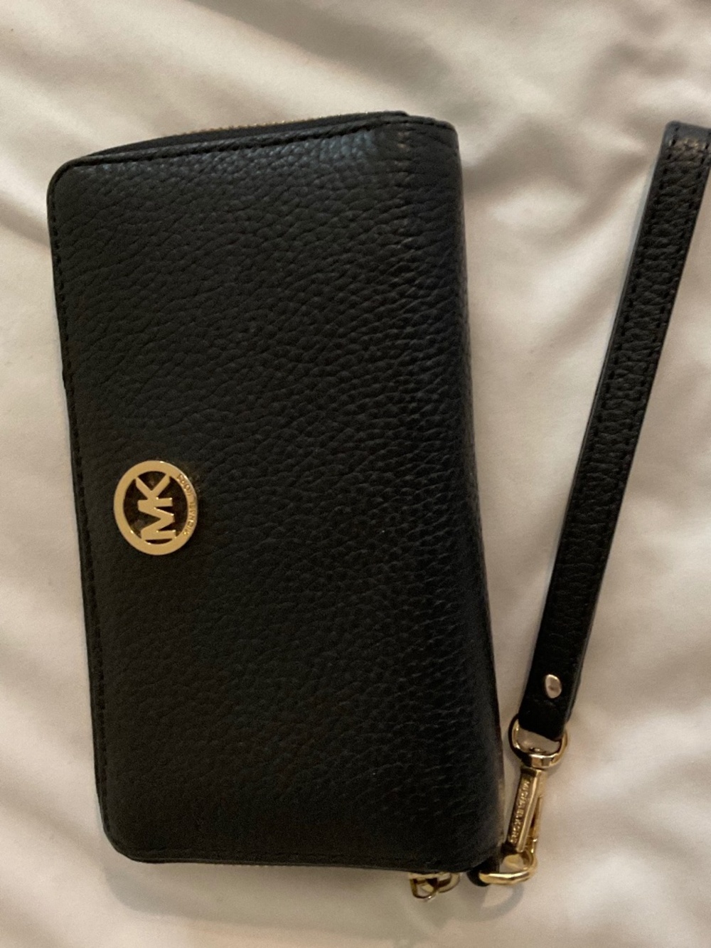 Michael Kors wallet wristlet, black with full zipper closer.